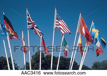 Stock Photo - a display of international 
flags blowing 
from flag poles 
outside. fotosearch 
- search stock 
photos, pictures, 
images, and photo 
clipart
