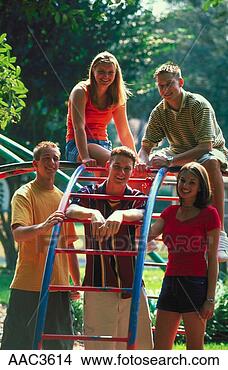 Stock Photo - outdoor portrait 
of five teenagers, 
 three boys and 
two girls. fotosearch 
- search stock 
photos, pictures, 
images, and photo 
clipart