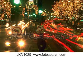 Stock Photograph - blurred lights 
of traffic on 
michigan avenue 
with christmas 
lights. fotosearch 
- search stock 
photos, pictures, 
images, and photo 
clipart