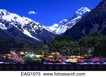 Stock Image - picnic lunch of 
food and wine 
spread out at 
the base of mount 
sefton. fotosearch 
- search stock 
photos, pictures, 
images, and photo 
clipart