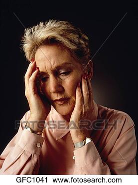 Stock Photography - portrait of woman 
looking worried 
or in pain. fotosearch 
- search stock 
photos, pictures, 
images, and photo 
clipart