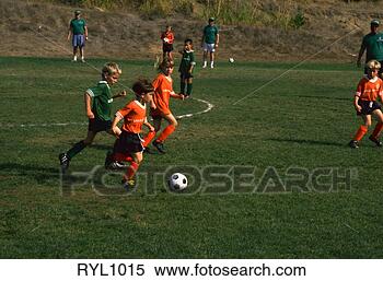 Stock Image - children playing 
soccer in santa 
cruz, california. 
fotosearch - search 
stock photos, 
pictures, images, 
and photo clipart