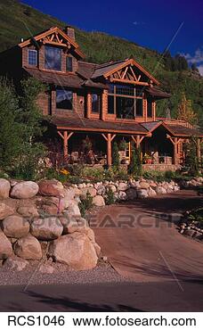 Stock Photo - exterior view 
of a western-style 
log chalet vacation 
home  property. 
fotosearch - search 
stock photos, 
pictures, images, 
and photo clipart