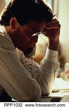Stock Photo - male executive 
on telephone in 
office,  vertical, 
 other versions. 
fotosearch - search 
stock photos, 
pictures, images, 
and photo clipart