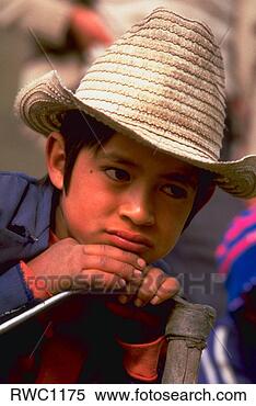 Stock Image - young farm boy 
rests his chin 
on his hoe in 
merida state in 
the. fotosearch 
- search stock 
photos, pictures, 
images, and photo 
clipart