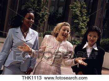 Stock Photo - a caucasian business 
woman,  an african 
american business 
woman and. fotosearch 
- search stock 
photos, pictures, 
images, and photo 
clipart