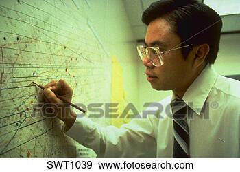 Stock Photograph - chinese geologist 
marking an oil 
lease map, houston, 
texas. fotosearch 
- search stock 
photos, pictures, 
images, and photo 
clipart