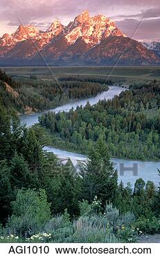 Stock Photography - grand tetons with 
snake river in 
foreground. fotosearch 
- search stock 
photos, pictures, 
images, and photo 
clipart