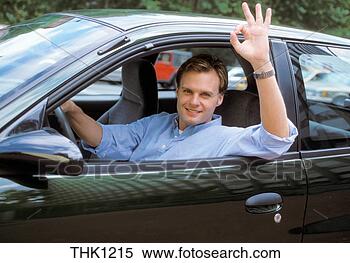 Stock Image - a man waves and 
makes a friendly 
hand gesture out 
the window of 
his. fotosearch 
- search stock 
photos, pictures, 
images, and photo 
clipart