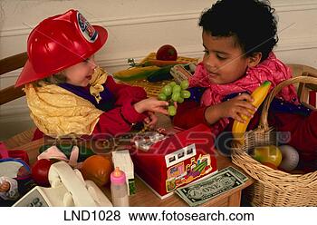 Stock Photo - young hispanic 
boy and young 
white girl playing 
together. fotosearch 
- search stock 
photos, pictures, 
images, and photo 
clipart