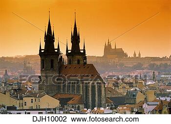 Stock Photo - tyn church and 
the castle in 
background at 
sunsetin old town. 
fotosearch - search 
stock photos, 
pictures, images, 
and photo clipart