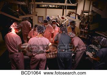 Stock Photo - aerial view of 
doctors and nurses 
tending to a patient 
in a trauma. fotosearch 
- search stock 
photos, pictures, 
images, and photo 
clipart