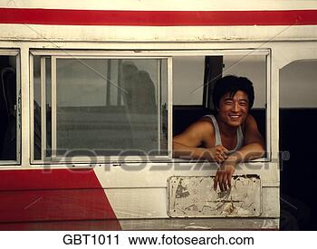 Stock Photography - asian man hanging 
out the window 
of a city bus 
in beijing, china. 
fotosearch - search 
stock photos, 
pictures, images, 
and photo clipart