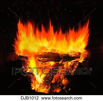 Stock Photo - close-up of a 
roaring wood fire 
burning with glowing 
embers in the. 
fotosearch - search 
stock photos, 
pictures, images, 
and photo clipart