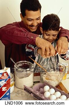 Stock Photo - father and son 
cooking. fotosearch 
- search stock 
photos, pictures, 
images, and photo 
clipart