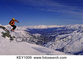 Stock Photograph - skier, backside 
of cardrona ski 
field, harris 
mountains, new 
zealand. fotosearch 
- search stock 
photos, pictures, 
images, and photo 
clipart