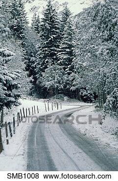 Stock Photo - a snow-covered 
country road winding 
through forest 
with snow-covered. 
fotosearch - search 
stock photos, 
pictures, images, 
and photo clipart
