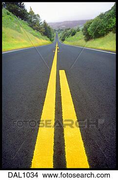 Stock Photo - view into the 
horizon down yellow 
lines on straight 
road with green. 
fotosearch - search 
stock photos, 
pictures, images, 
and photo clipart