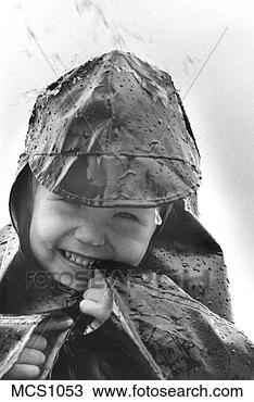 Stock Photo - young boy in rain 
hat and raincoat 
laughing in the 
rain. fotosearch 
- search stock 
photos, pictures, 
images, and photo 
clipart