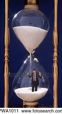 Stock Photography - businessman trying 
to break out of 
the time pressure 
trap,  computer. 
fotosearch - search 
stock photos, 
pictures, images, 
and photo clipart
