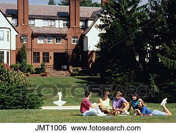Stock Photo - group of college 
students talking 
on lawn at college 
campus. fotosearch 
- search stock 
photos, pictures, 
images, and photo 
clipart