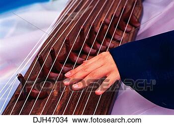 Stock Photo - korea, korean 
zither music. 
fotosearch - search 
stock photos, 
pictures, images, 
and photo clipart