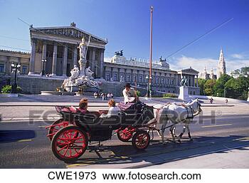 Stock Photo - carriage with 
tourists on ring 
road passing parliament 
and athena. fotosearch 
- search stock 
photos, pictures, 
images, and photo 
clipart