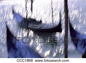 Stock Photo - italy venice gondolas 
gondolas moored 
at molo san marco 
blurred. fotosearch 
- search stock 
photos, pictures, 
images, and photo 
clipart