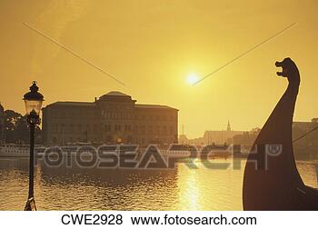Stock Photo - viking ship bow 
and lamp post 
on skeppsbron 
in stockholm at 
sunrise. fotosearch 
- search stock 
photos, pictures, 
images, and photo 
clipart