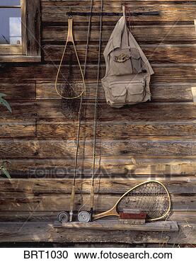 Stock Photography - fly fishing equipment 
including vest, 
 rods,  nets and 
fly boxes. fotosearch 
- search stock 
photos, pictures, 
images, and photo 
clipart