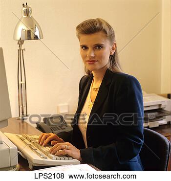 Stock Photo - 04 portrait of 
a woman working 
at computer. fotosearch 
- search stock 
photos, pictures, 
images, and photo 
clipart