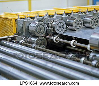 Stock Photo - 26 rollers of 
a machine for 
cutting sheet 
steel. fotosearch 
- search stock 
photos, pictures, 
images, and photo 
clipart