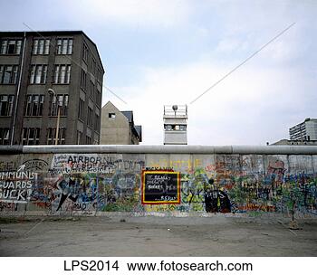Stock Photo - 33 1986 germany 
berlin wall with 
graffiti and watchtower 
at. fotosearch 
- search stock 
photos, pictures, 
images, and photo 
clipart