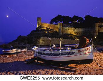 Stock Image - fishing boats 
on sandy shore 
at tossa de mar 
in girona province 
of. fotosearch 
- search stock 
photos, pictures, 
images, and photo 
clipart