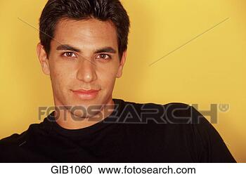Stock Photography - close-up portrait 
of a young, hispanic 
man. fotosearch 
- search stock 
photos, pictures, 
images, and photo 
clipart