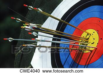 Stock Photography - arrows in or near 
the bulls eye 
of target during 
olympic archery. 
fotosearch - search 
stock photos, 
pictures, images, 
and photo clipart