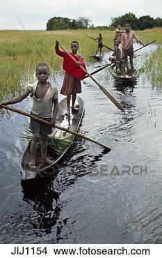 Stock Photo - children of libinza 
tribe going to 
school by canoe, 
 ngiri river. 
fotosearch - search 
stock photos, 
pictures, images, 
and photo clipart