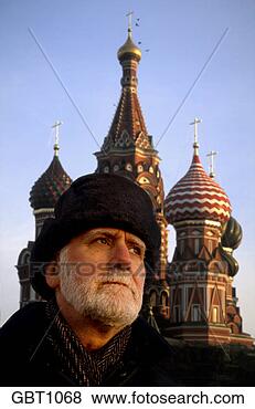 Stock Photo - portrait of a 
russian man standing 
in front of saint 
basil cathedral. 
fotosearch - search 
stock photos, 
pictures, images, 
and photo clipart