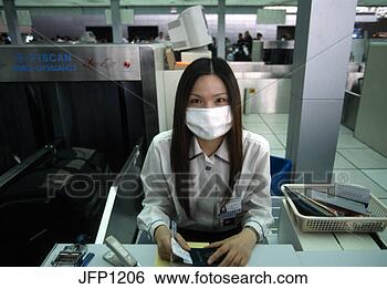 Stock Photo - female employee 
at ticket & baggage 
check counter; 
gudong. fotosearch 
- search stock 
photos, pictures, 
images, and photo 
clipart