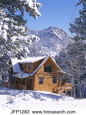 Stock Photo - rustic log cabin 
home covered in 
snow, rocky mtns, 
co. fotosearch 
- search stock 
photos, pictures, 
images, and photo 
clipart