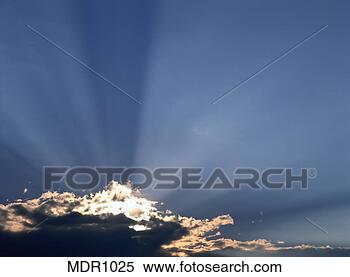 Stock Image - crepuscular rays 
and passing storm. 
fotosearch - search 
stock photos, 
pictures, images, 
and photo clipart