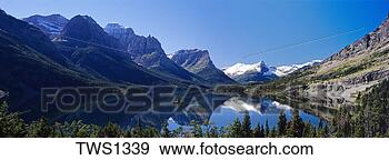 Stock Photograph - mirror smooth 
lake saint mary 
surrounds wild 
goose island in 
autum. fotosearch 
- search stock 
photos, pictures, 
images, and photo 
clipart