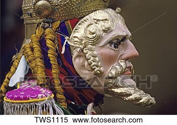 Stock Image - myan dancer wears 
hand carved wooden 
mask depicting 
spanish conqueror. 
fotosearch - search 
stock photos, 
pictures, images, 
and photo clipart