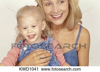 Stock Photography - portrait of a 
mother holding 
her daughter. 
fotosearch - search 
stock photos, 
pictures, images, 
and photo clipart