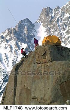 Stock Photo - climber repelling 
from a winter 
camp below basin 
mountain,  eastern. 
fotosearch - search 
stock photos, 
pictures, images, 
and photo clipart