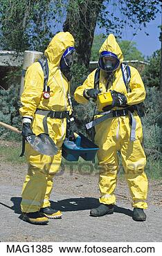 Stock Image - hazmat team prepares 
to approach toxic 
substance spill. 
fotosearch - search 
stock photos, 
pictures, images, 
and photo clipart