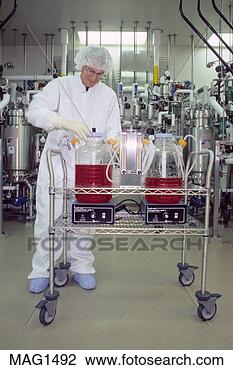 Stock Photo - model released 
man bioengineer 
process solution 
genetech. fotosearch 
- search stock 
photos, pictures, 
images, and photo 
clipart
