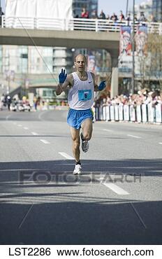 Stock Photo - vancouver sun 
fun run 10k 3rd 
place joel bourgeois 
29m46s. fotosearch 
- search stock 
photos, pictures, 
images, and photo 
clipart