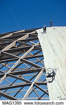 Stock Image - workers build 
dome wood construction. 
fotosearch - search 
stock photos, 
pictures, images, 
and photo clipart