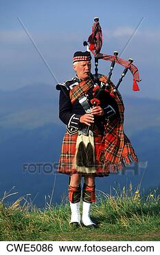 Stock Photo - bagpiper at loch 
broom in scottish 
highlands. fotosearch 
- search stock 
photos, pictures, 
images, and photo 
clipart